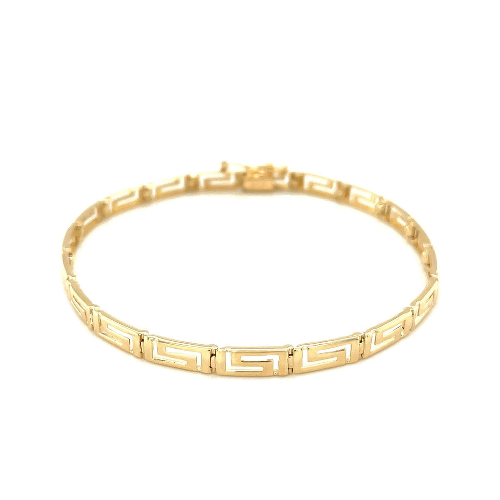 14k yellow gold Greek fret design fancy bracelet with intricate pattern and polished finish, stylish jewelry accessory.