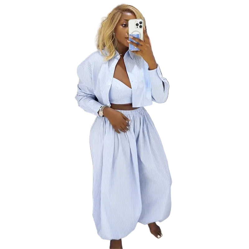 Striped strapless top and wide-leg pants set by Plush Fashion Hub, stylish coastal chic fashion ensemble.