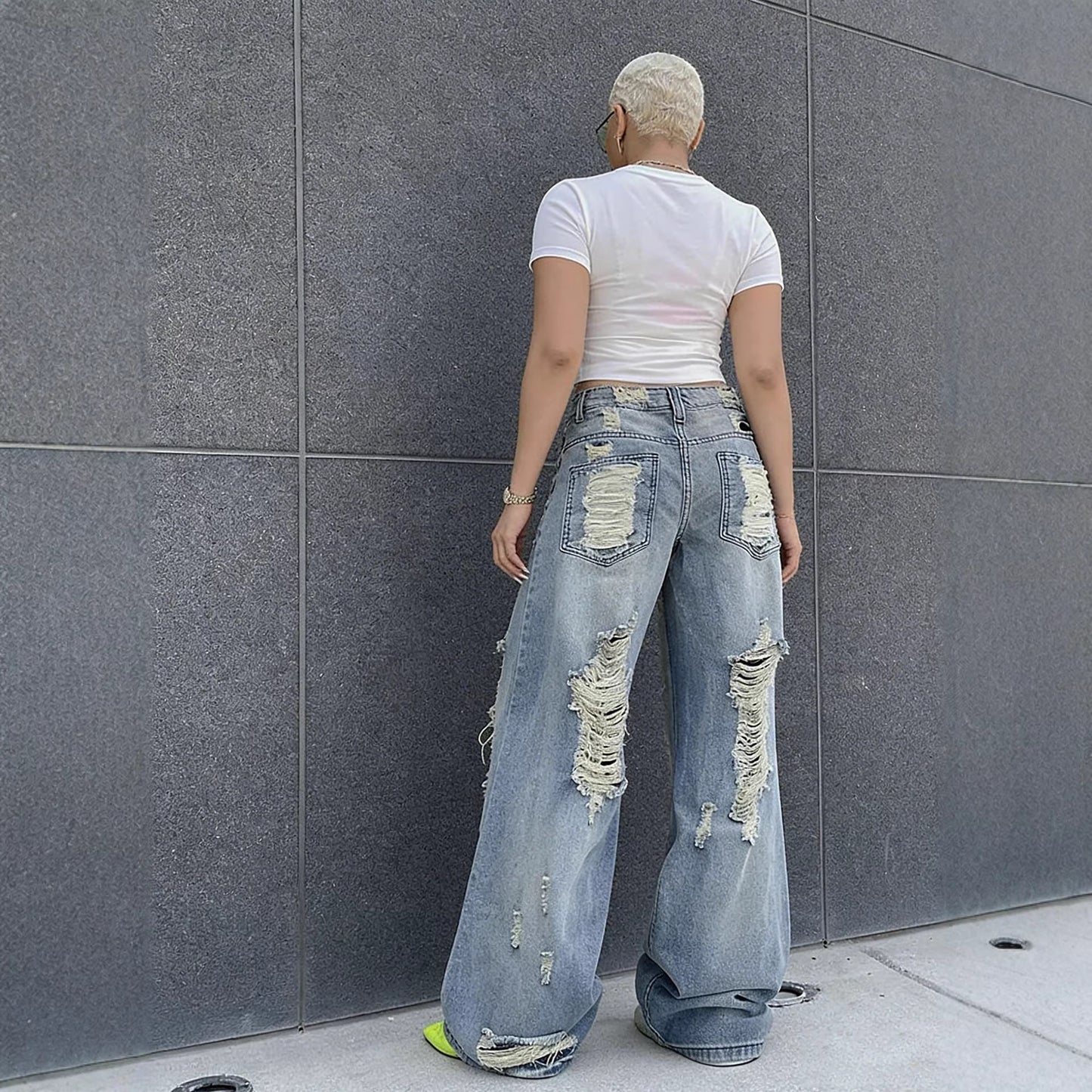 Eprolo washed straight leg ripped jeans showing distressed details and classic fit in denim fabric.