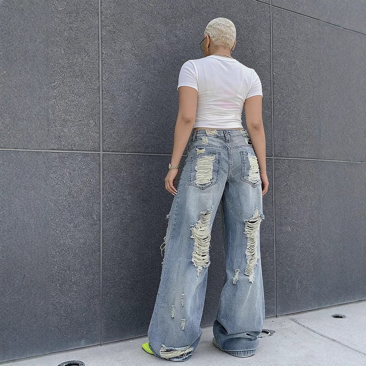 Washed straight-leg ripped jeans by Plush Fashion Hub, featuring distressed details and a casual fit for everyday wear.