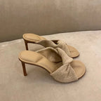 Elegant bow-accent stiletto heels by eprolo featuring slim straps and a sleek design, perfect for stylish evening wear