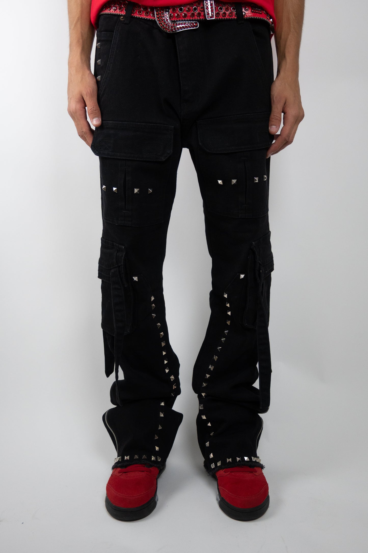 Plush Fashion Hub studded stacked cargo jeans with multiple pockets and metal stud accents, casual denim pants for everyday wear.