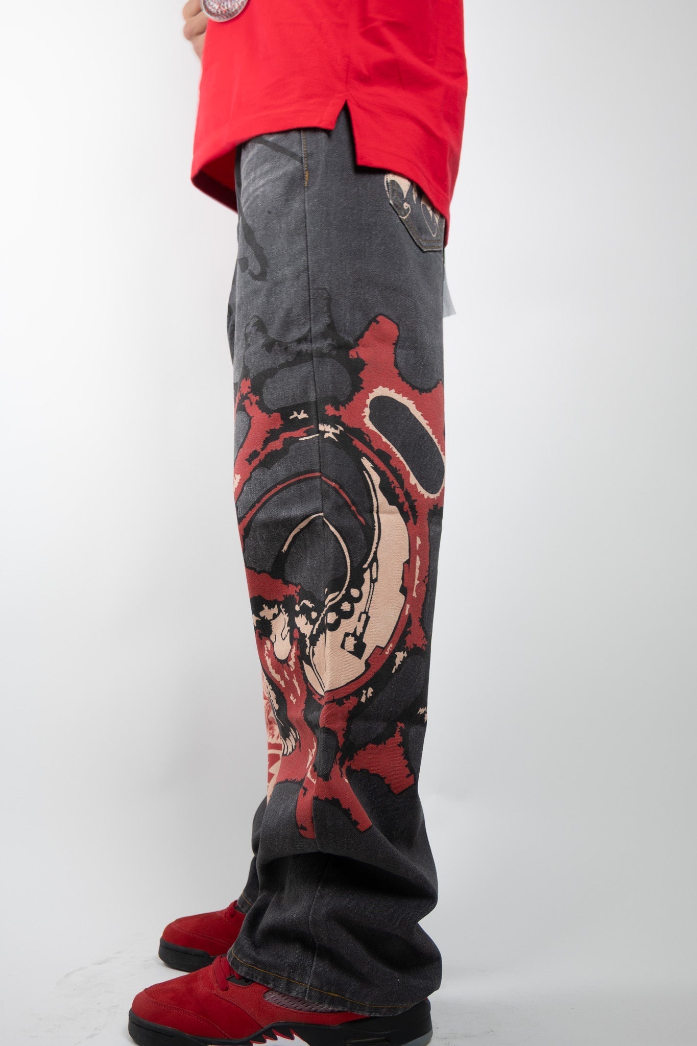 Graphic printed baggy jeans from Plush Fashion Hub featuring a relaxed fit and bold graphic design.