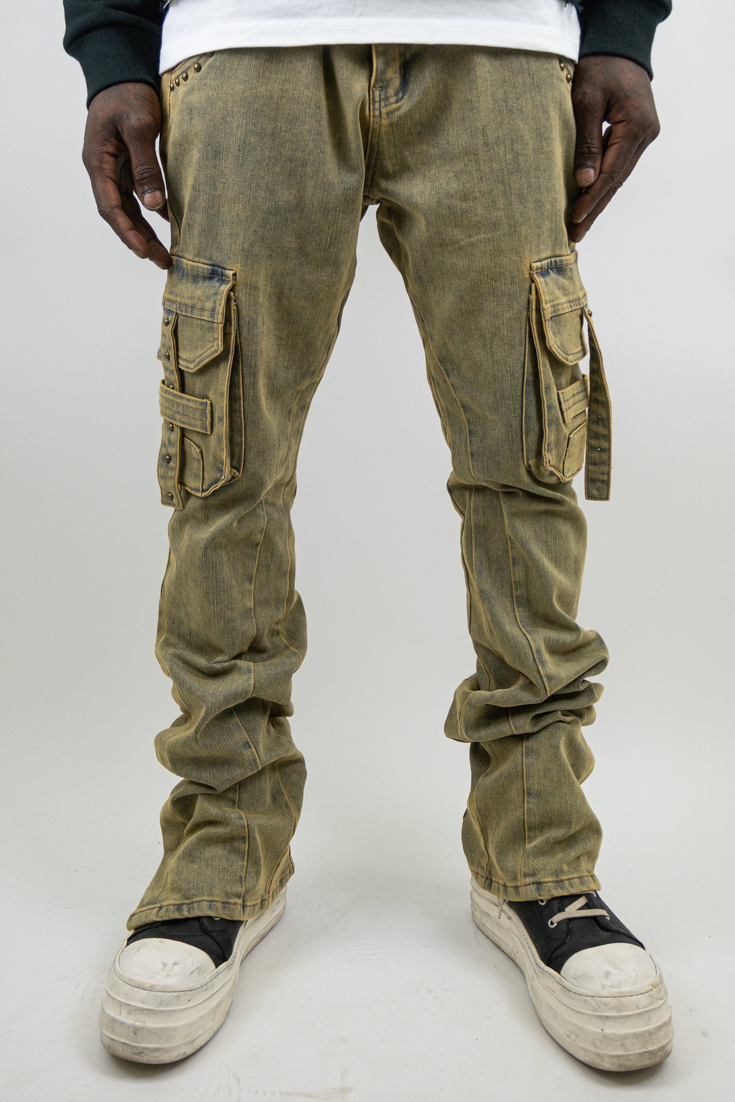 ARMOR JEANS RM207SK studded stacked cargo jeans showing distressed denim, multiple pockets, and metal stud details.