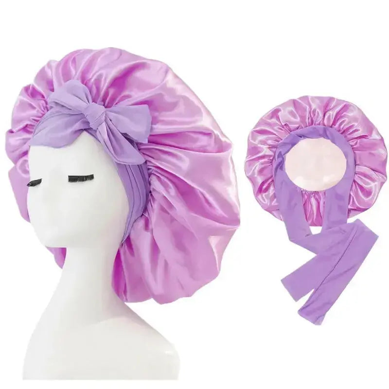 Double-layer satin ribbon hair bonnet for sleep protection, plush fabric, round design with bow for gentle hair care.
