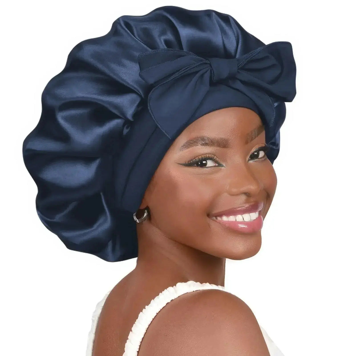 Double-layer satin ribbon hair bonnet for sleep protection, plush design with a bow, by Plush Fashion Hub.