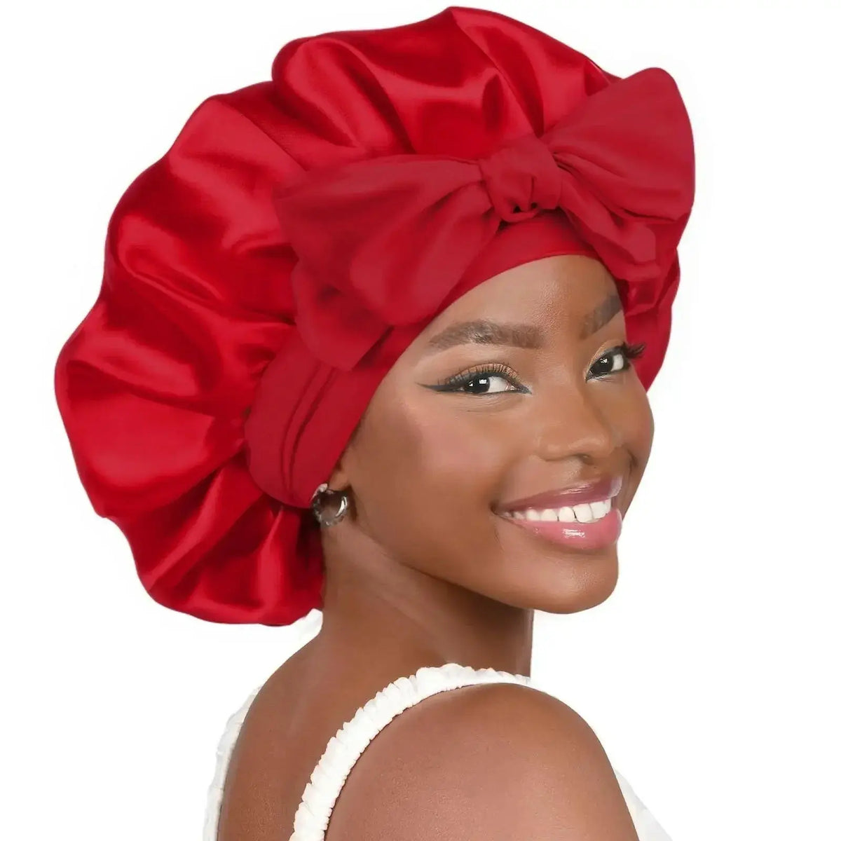 Double-layer satin ribbon bonnet for sleep protection, plush fabric, round shape, stylish hair care accessory by Plush Fashion Hub