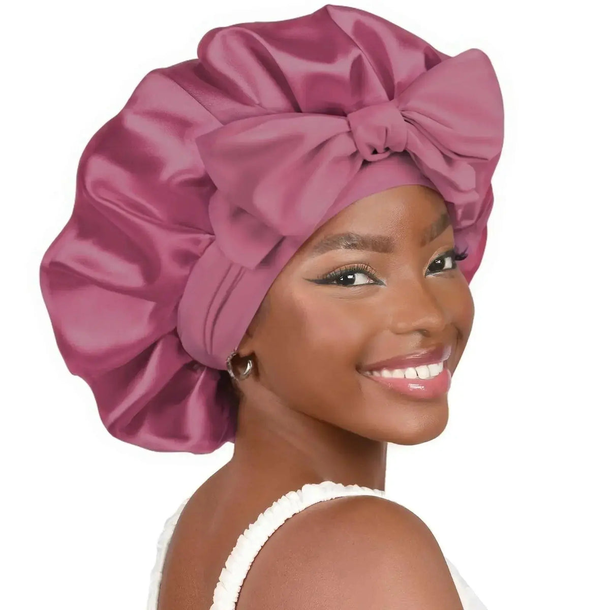 Double-layer satin ribbon hair bonnet by Plush Fashion Hub, designed to protect hair while sleeping with a stylish bow detail.