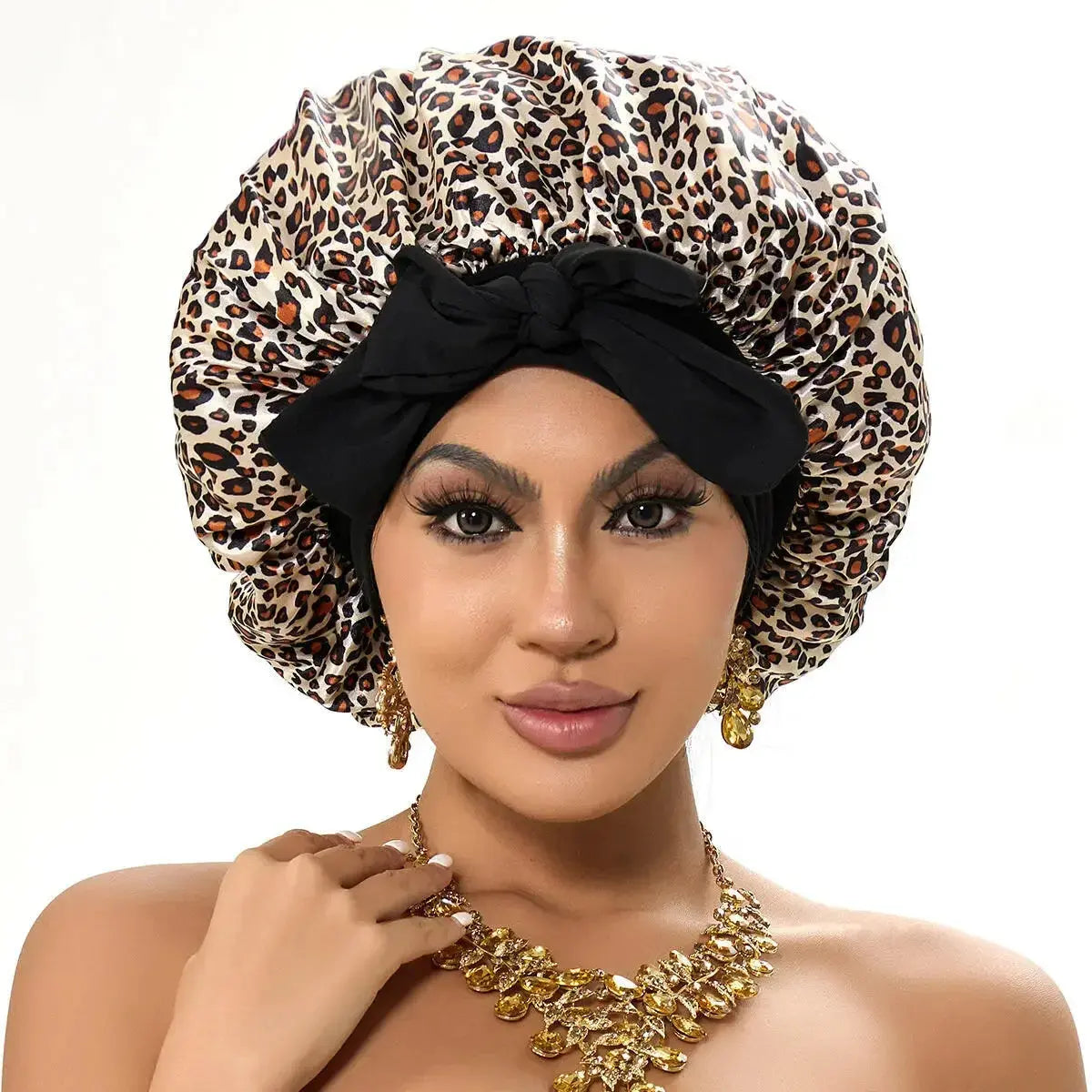 Double-layer satin ribbon hair bonnet from Plush Fashion Hub with a bow for sleep protection and hair care.