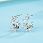 Minimalist 925 silver wave earrings and studs with sleek, modern design, perfect for everyday wear.