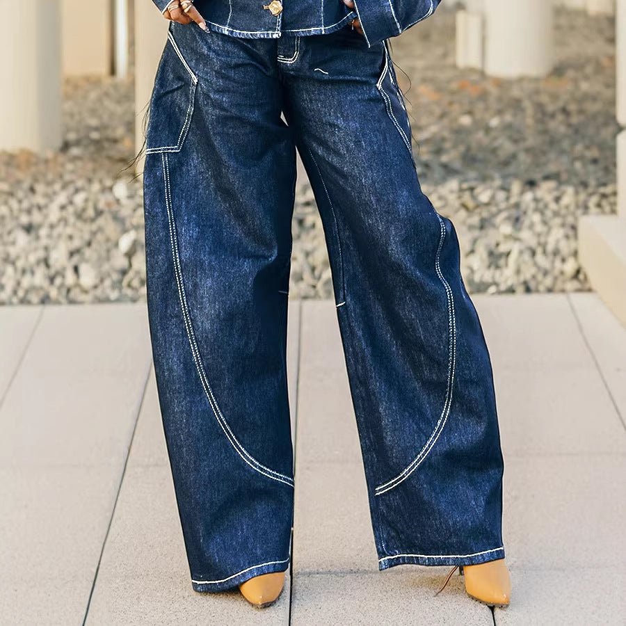 Curved hem stitched denim jeans by Plush Fashion Hub, showcasing classic blue denim with detailed stitching and a curved hem design.