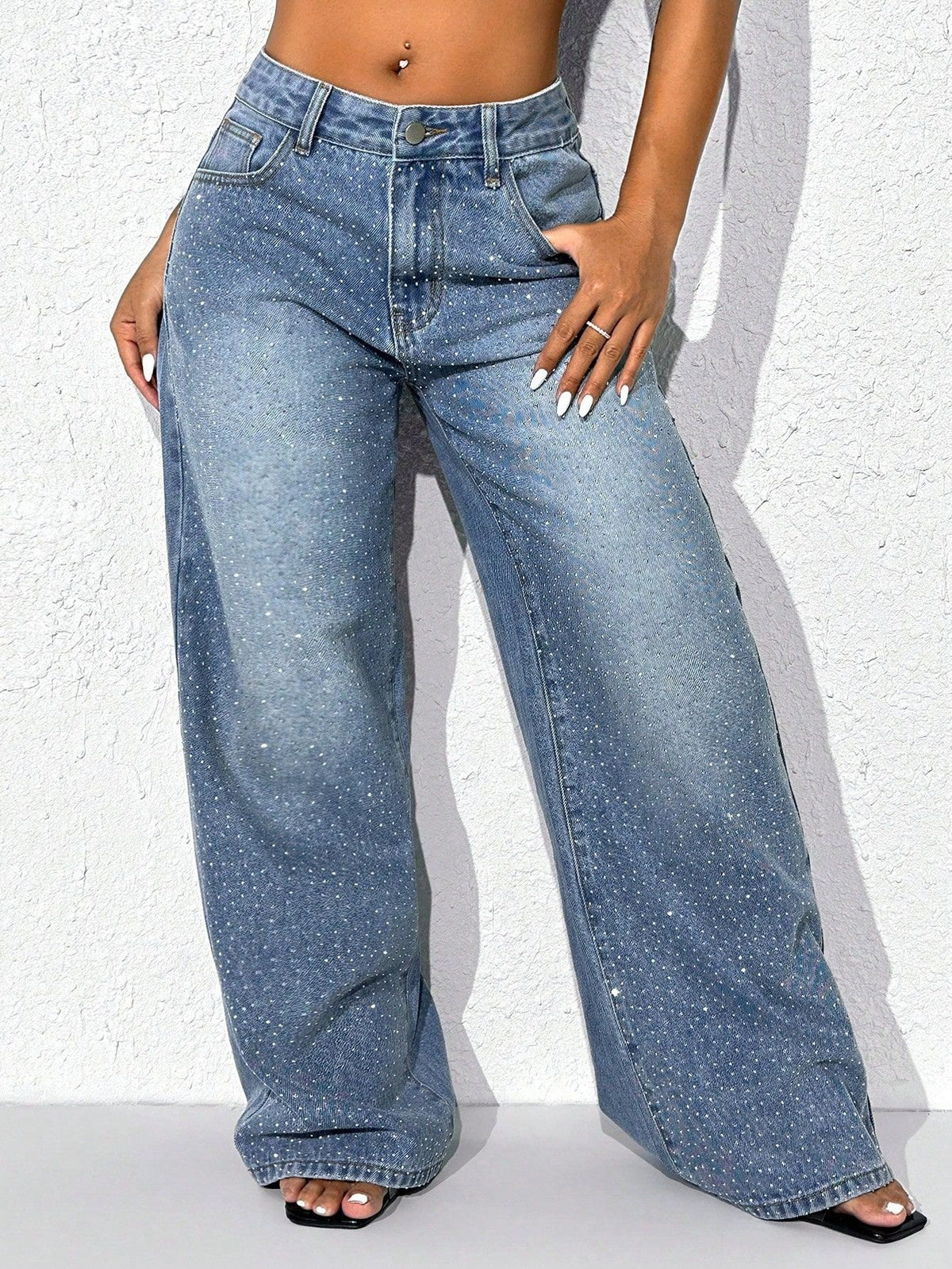 High-waisted embellished wide-leg denim jeans by Plush Fashion Hub, featuring decorative details and a stylish fit.