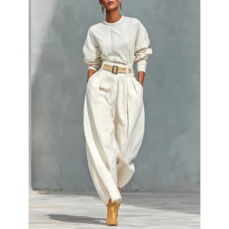 Relaxed two-piece wide-leg set with belt from Plush Fashion Hub, featuring a stylish top and matching pants in a comfortable, casual style.
