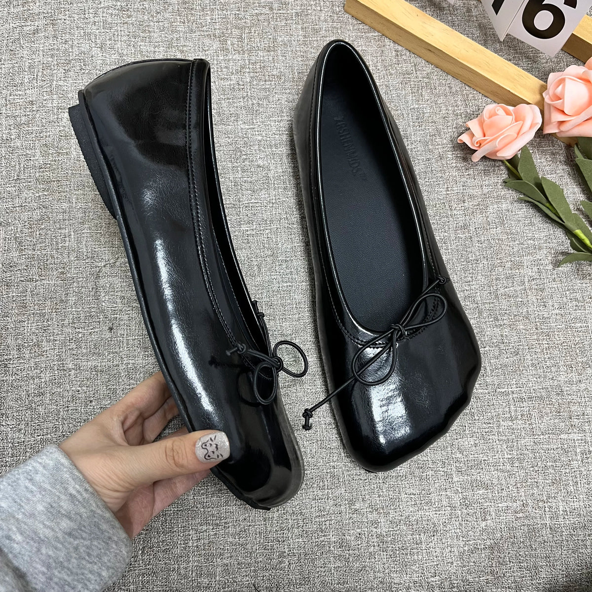 Black and silver round toe slip-on loafers from Plush Fashion Hub, showcasing sleek design and comfortable fit.