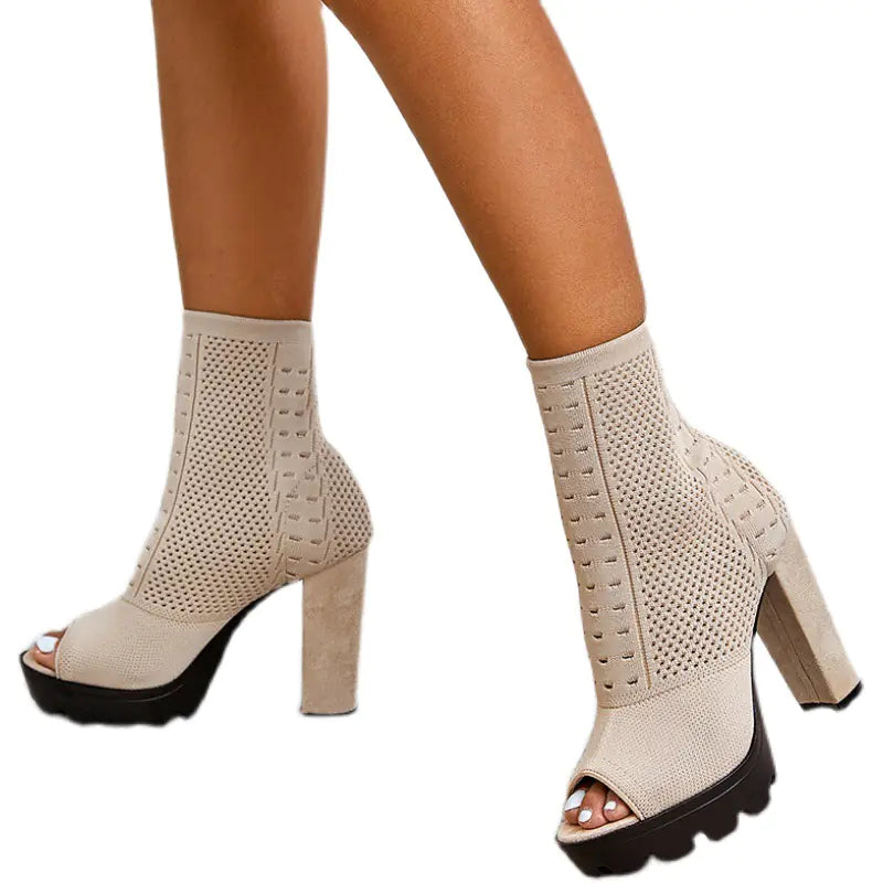 Chunky high heel round toe fish mouth shoes for women in black, featuring bold design and stylish platform soles.