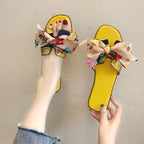 Women's summer flat slippers with bow detail from Trendy Attic Store01, featuring comfortable women's sandals in a stylish design.