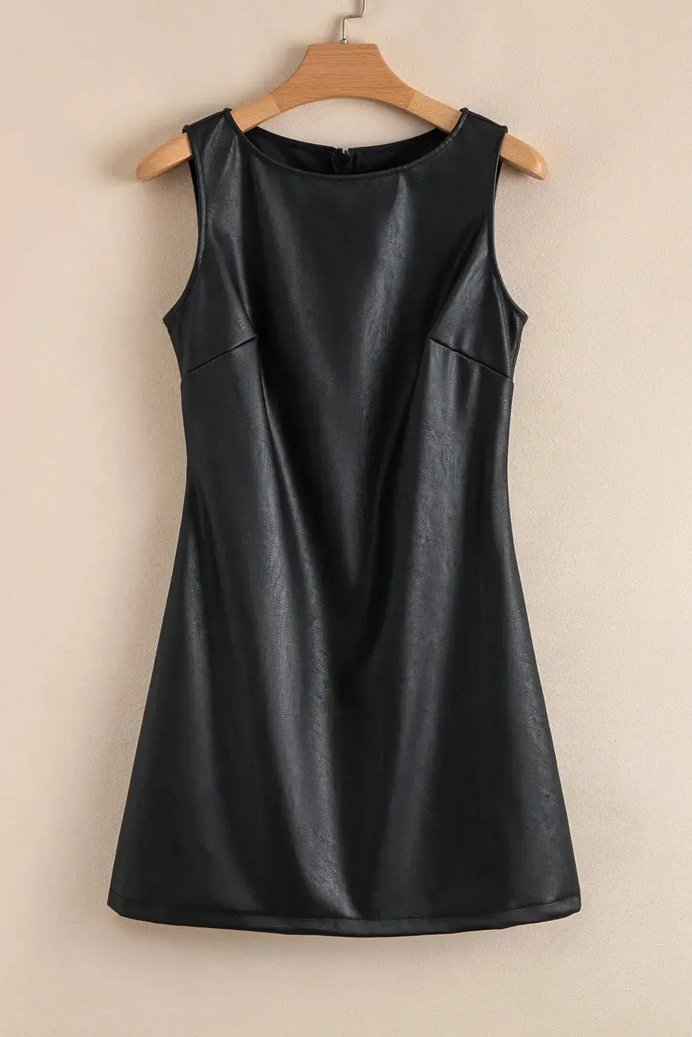 Emelia leather sleeveless mini dress by Threaded Pear featuring a fitted silhouette and stylish design, perfect for chic occasions.