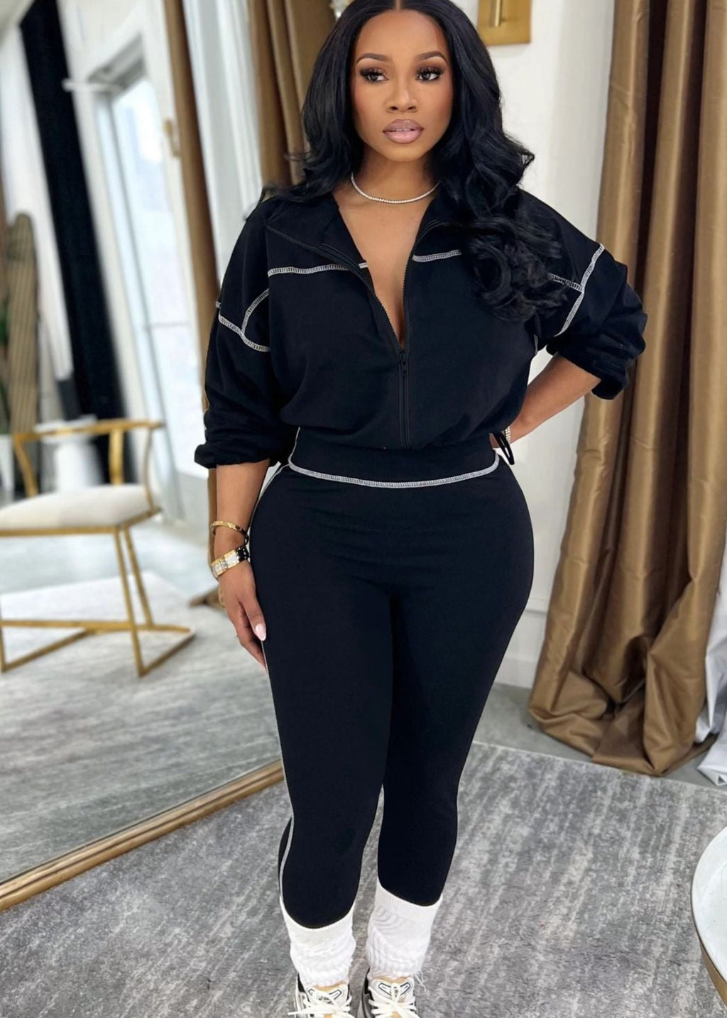 Eprolo modern zip-front long sleeve two-piece set with tops, featuring a sleek design and comfortable fit, shown in the image.
