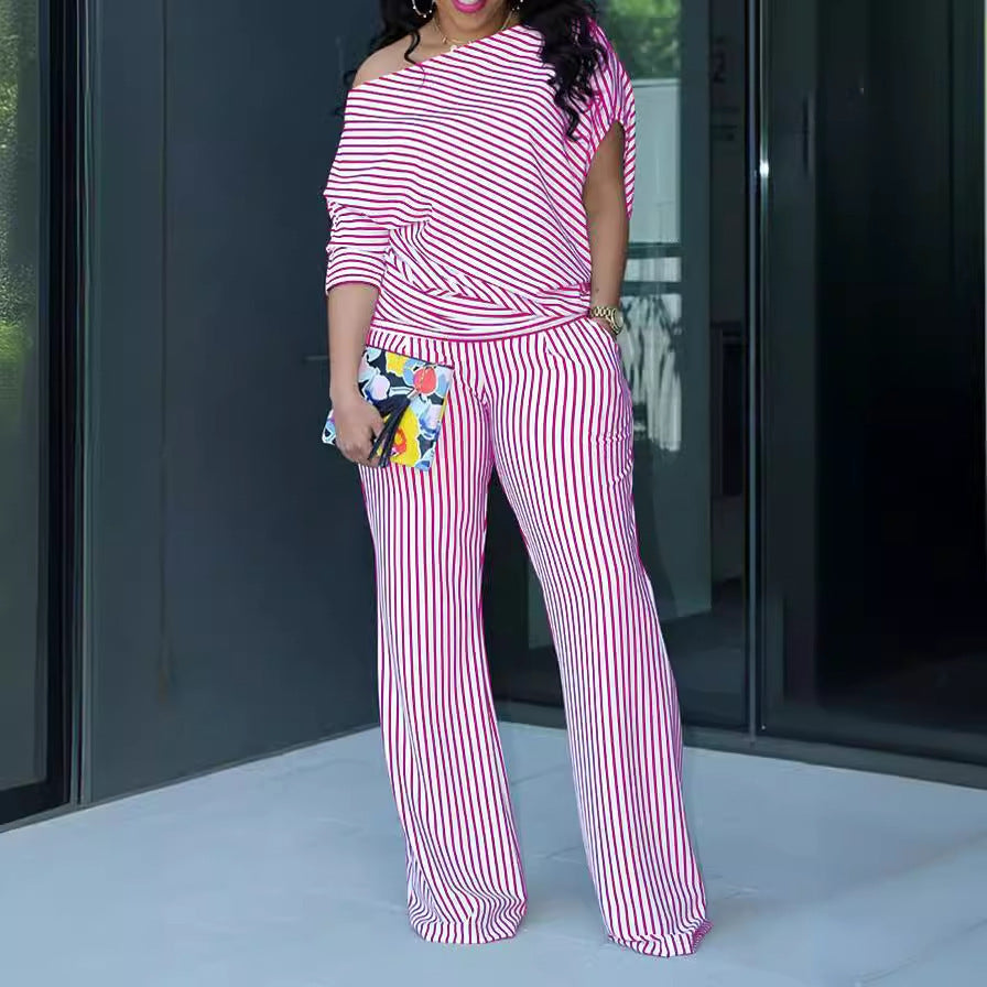 Asymmetrical off-shoulder two-piece top set from Plush Fashion Hub, featuring a stylish, modern design with ruffled details.
