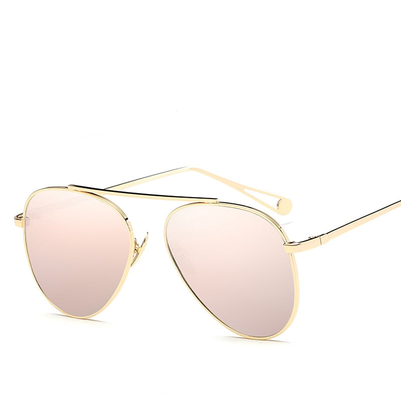 Luxury Plush Fashion Hub pilot women's sunglasses with vintage aviation-inspired design, stylish eyewear for women.