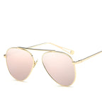 Luxury Plush Fashion Hub pilot women's sunglasses with vintage aviation-inspired design, stylish eyewear for women.
