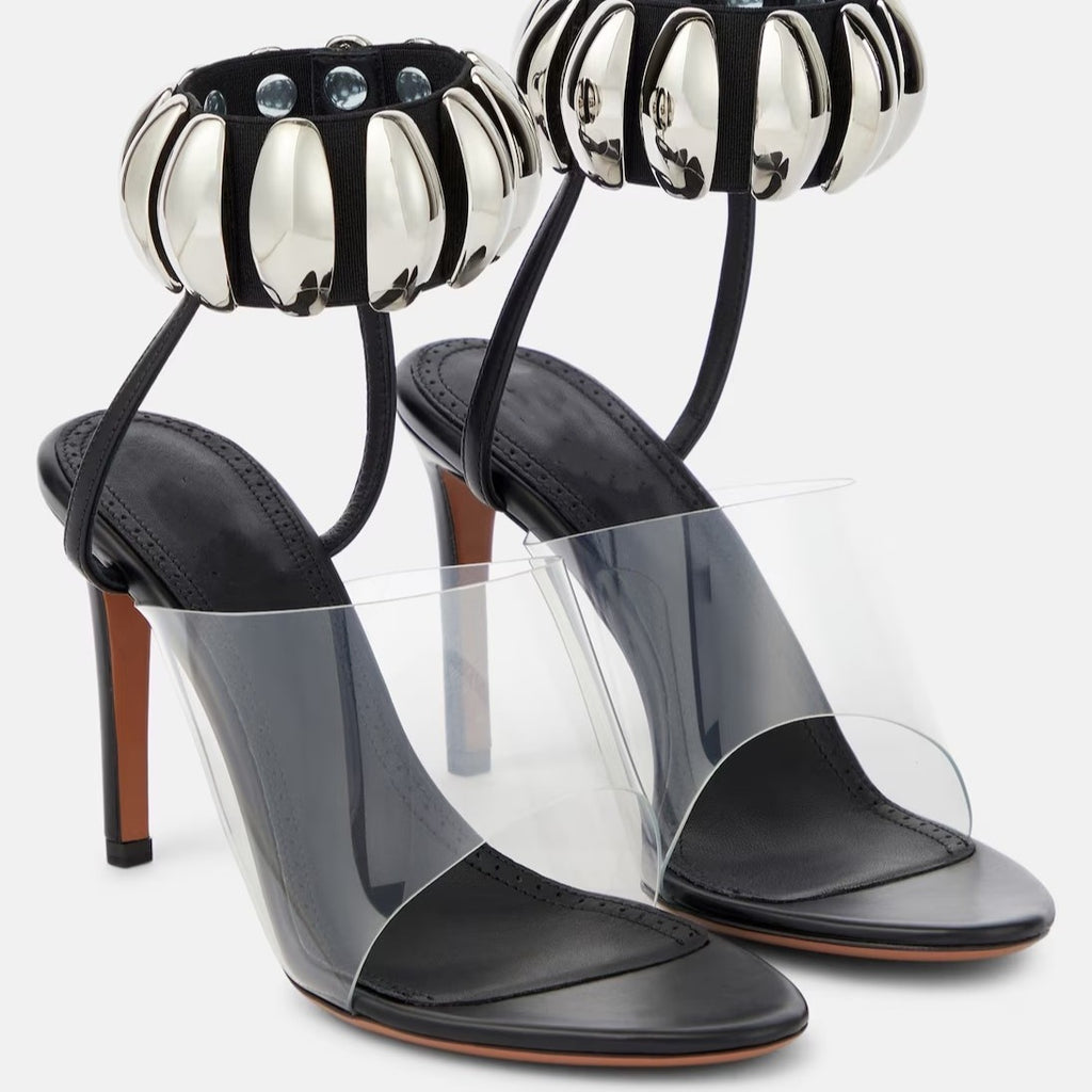 eprolo clear buckle open-toe stilettos heels featuring a transparent strap and sleek stiletto heel design.