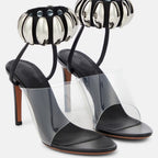 eprolo clear buckle open-toe stilettos heels featuring a transparent strap and sleek stiletto heel design.
