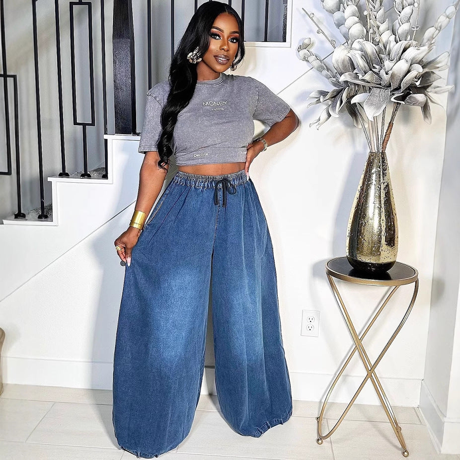 Relaxed fit wide-leg denim jeans by Plush Fashion Hub, showing the light blue, high-waisted design and casual style.