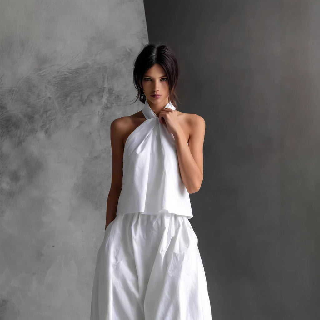 Women's loose sleeveless top and high-waist wide-leg pants set by FitiqueFit, shown in four different colors, casualwear style.