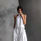 Women's loose sleeveless top and high-waist wide-leg pants set by FitiqueFit, shown in four different colors, casualwear style.