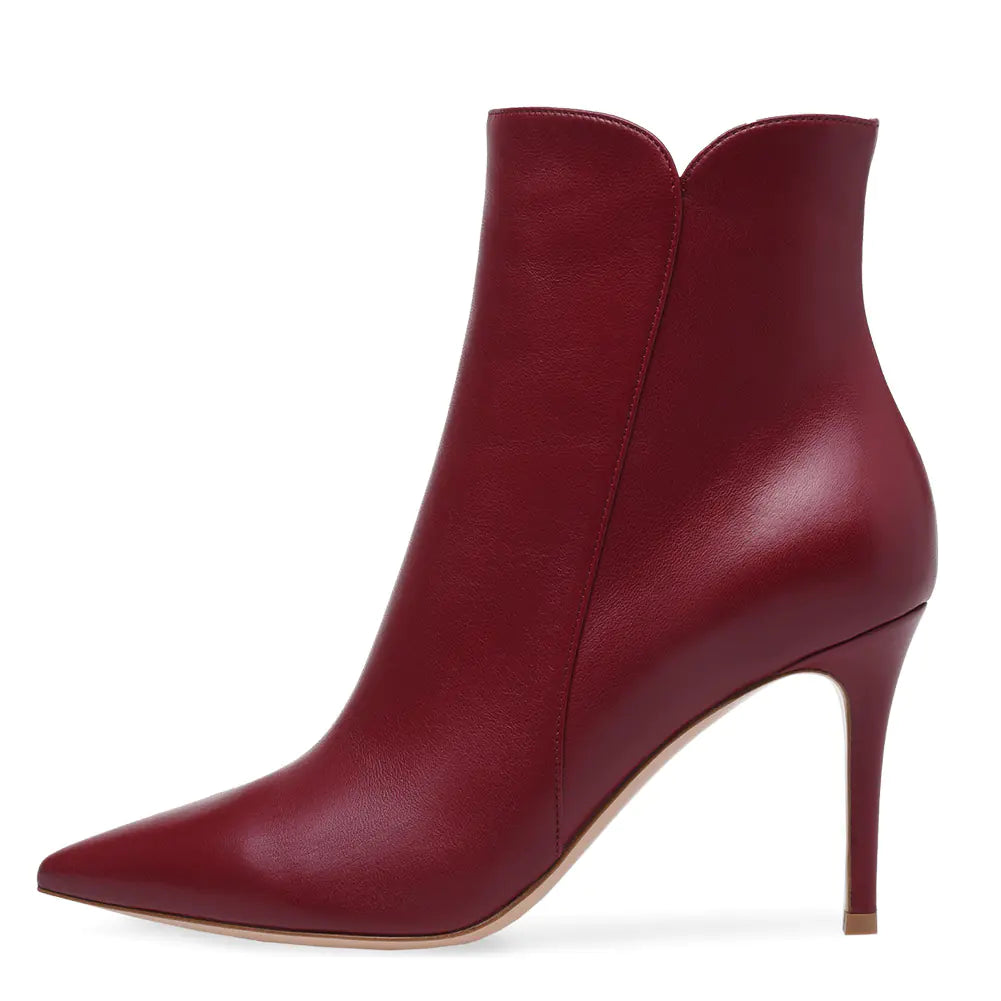 Women's high heel pointed toe ankle boots from Trendy Attic Store01, showcasing sleek black leather with stiletto heels.