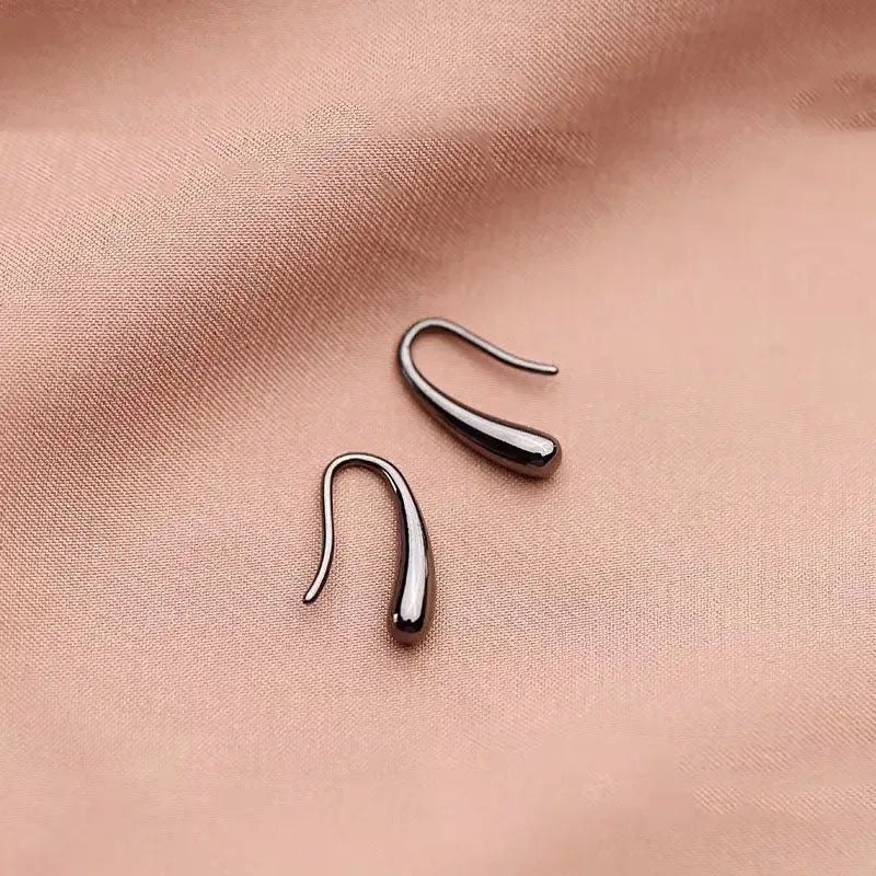 Minimalist lightweight sterling silver drop earrings for women, featuring simple elegant design from Plush Fashion Hub.