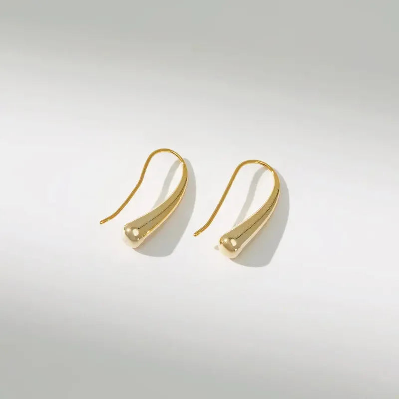 Minimalist lightweight sterling silver drop earrings for women, featuring a sleek and simple design.