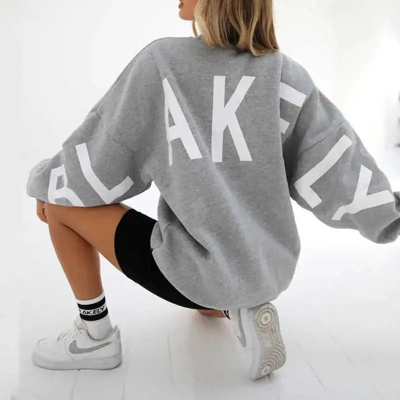 Oversized Plush Fashion Hub graphic print long sleeve sweatshirt with a cozy, thickened urban pullover design.