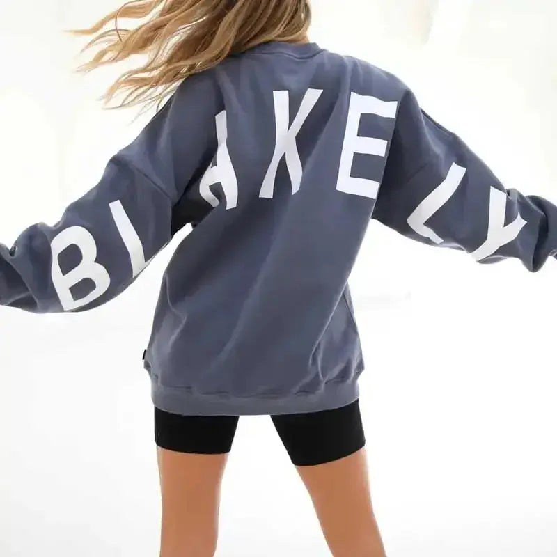Oversized Plush Fashion Hub graphic print long sleeve sweatshirt with cozy, thick material and urban style.