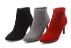 Women's black pointed toe ankle boots with super high heels from Trendy Attic Store01, showcasing sleek design and stylish silhouette.