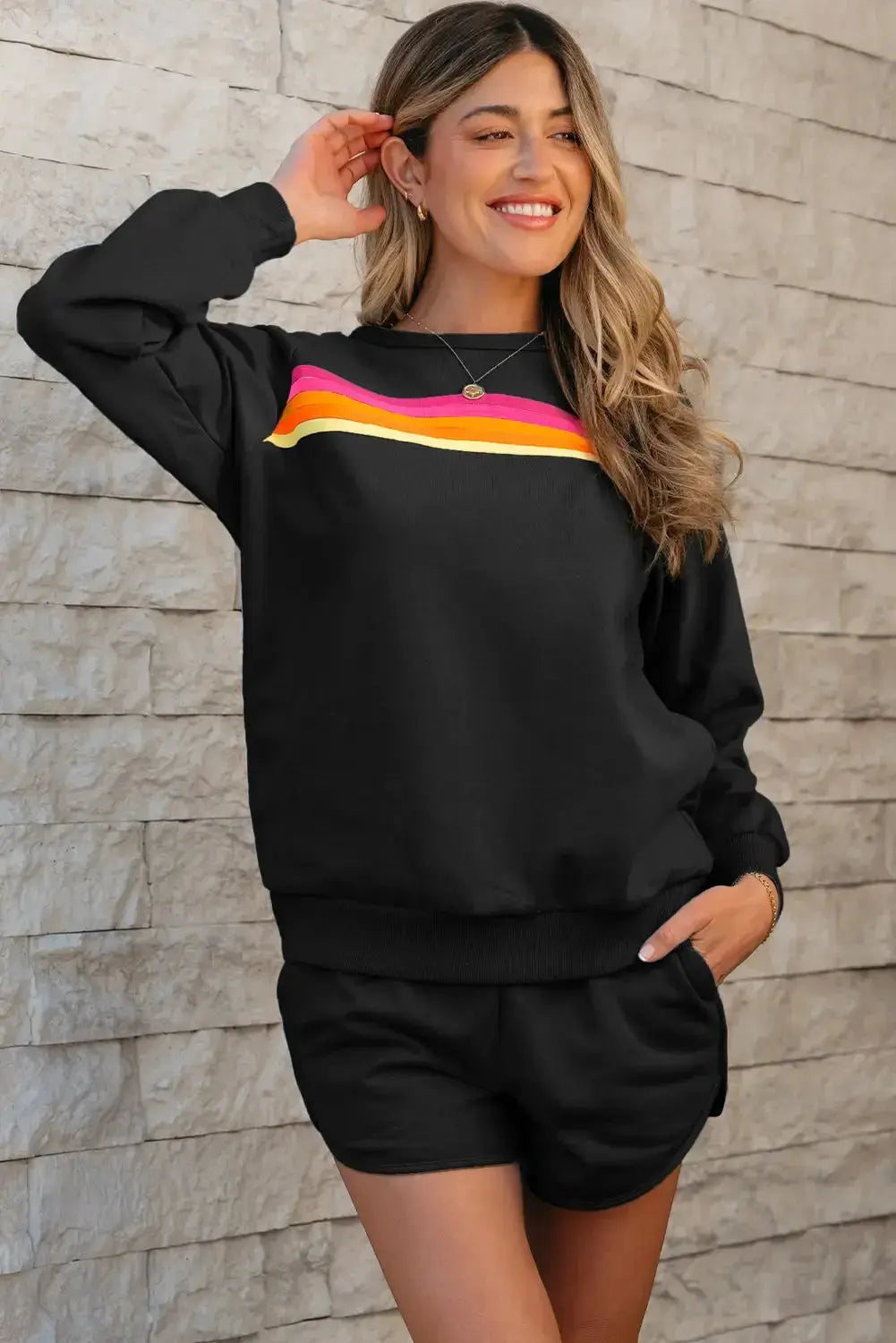 Bright rainbow print high waist sweatpants by Threaded Pear, featuring a comfortable fit and casual style.