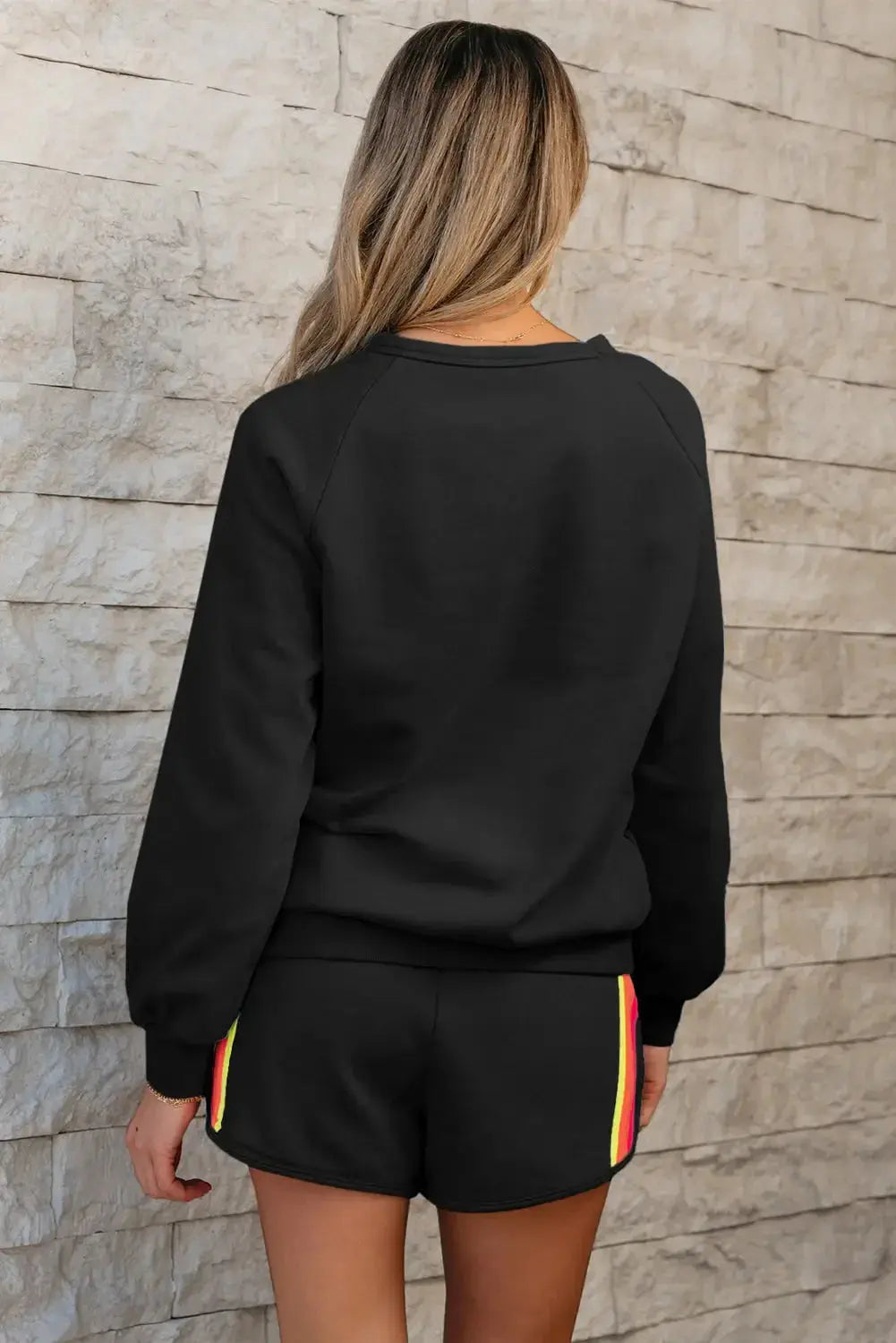 Finley Rainbows high waist sweatpants by Threaded Pear featuring rainbow print and comfortable fit, shown in a casual style.