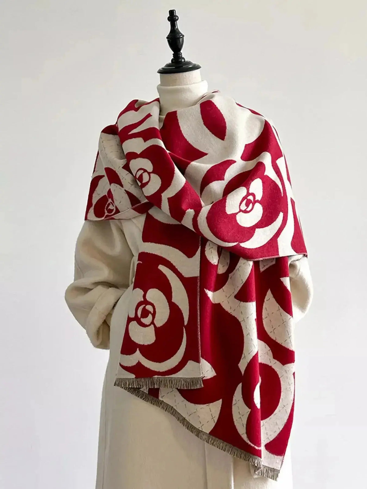 Floral patterned winter scarf by Plush Fashion Hub, soft and cozy accessory for autumn warmth and stylish winter wear.