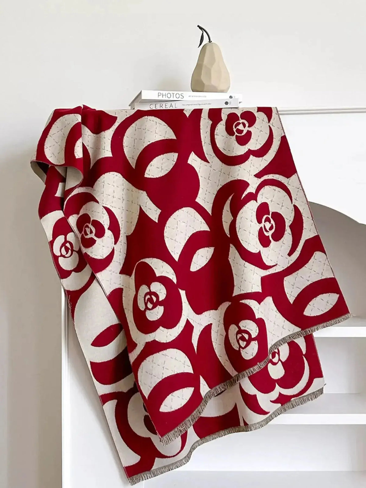 Floral patterned winter scarf from Plush Fashion Hub, soft and cozy for autumn warmth and stylish accessories.
