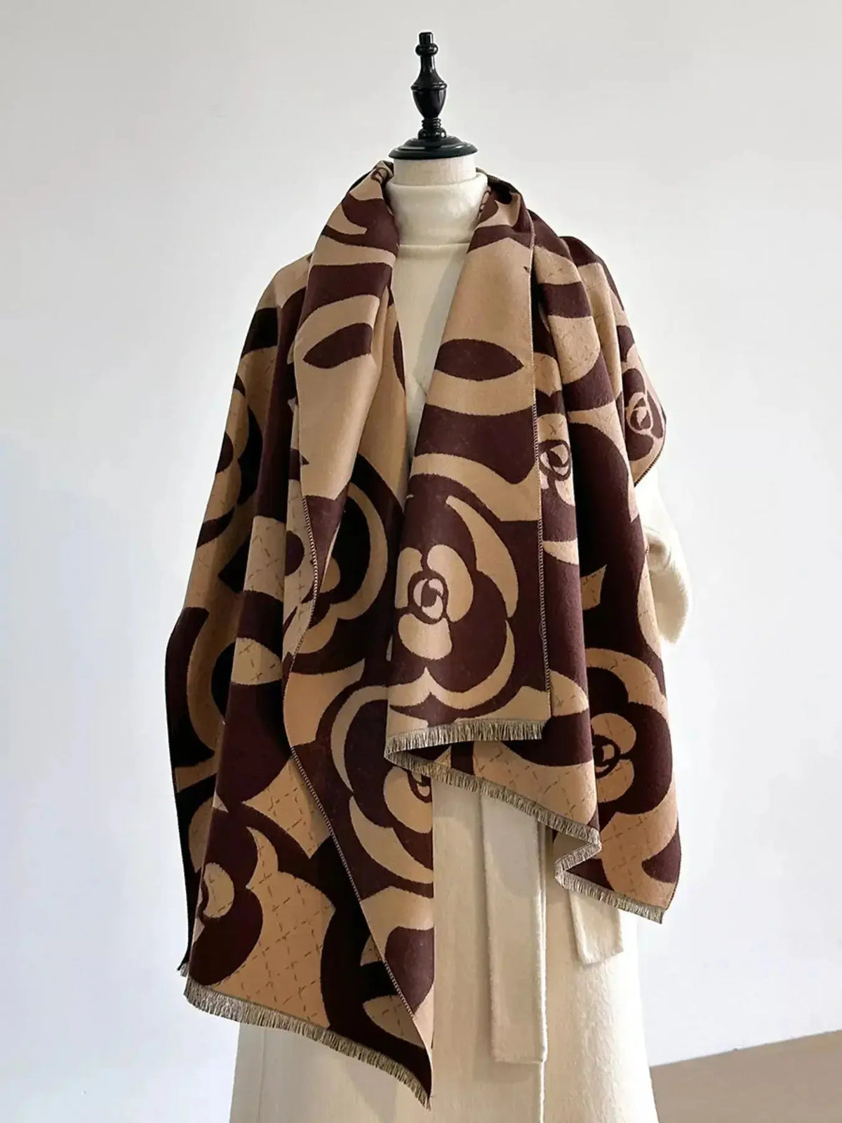 Floral patterned winter scarf by Plush Fashion Hub, soft and cozy accessory for warmth in autumn and winter.