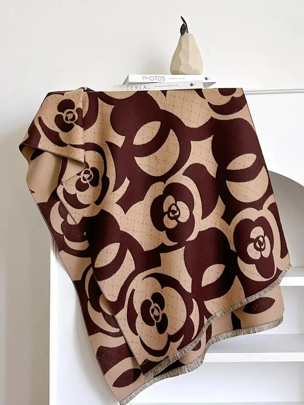 Floral patterned winter scarf from Plush Fashion Hub, showcasing soft, cozy fabric perfect for autumn warmth.
