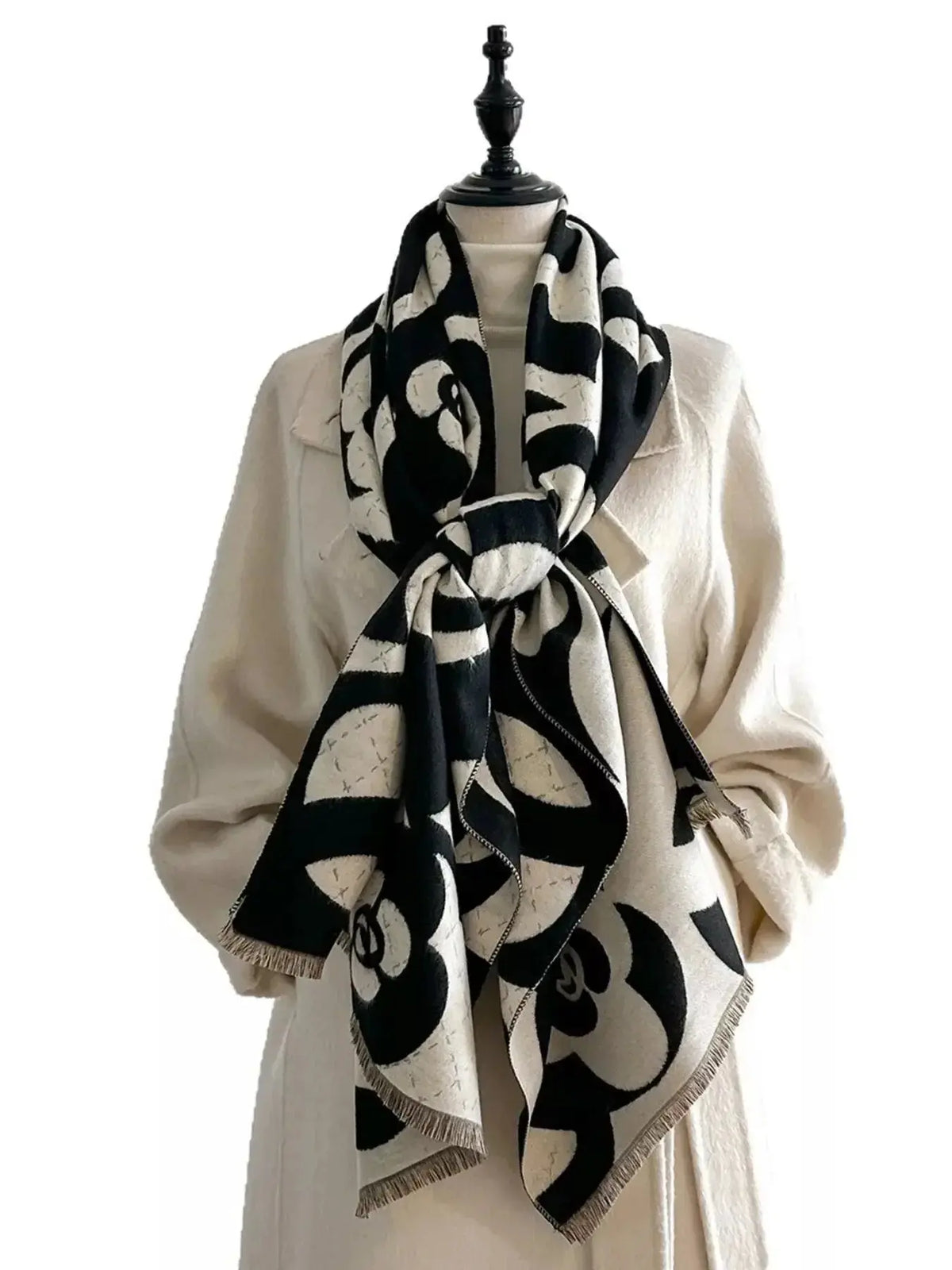 Floral patterned winter scarf from Plush Fashion Hub, soft and cozy accessory designed for warmth during autumn and winter.