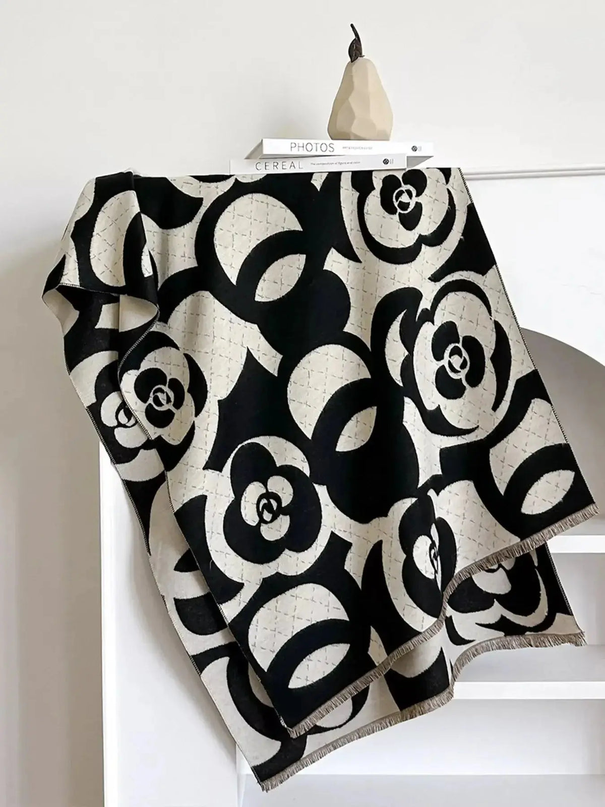 Floral patterned winter scarf from Plush Fashion Hub, soft and cozy for autumn warmth and stylish accessories.