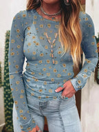 Floral print long sleeve sheer mesh blouse by Plush Fashion Hub, feminine layering top with delicate floral design and lightweight fabric.