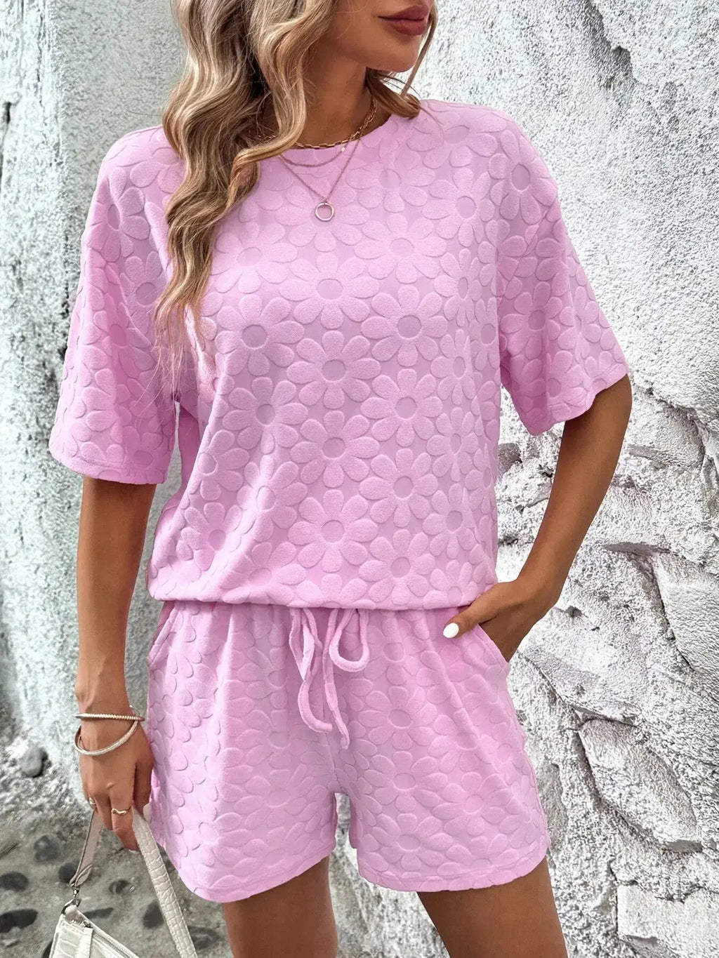 Floral print round neck top and shorts lounge set by Trendsi, soft pajamas with vibrant floral design for comfortable lounging.
