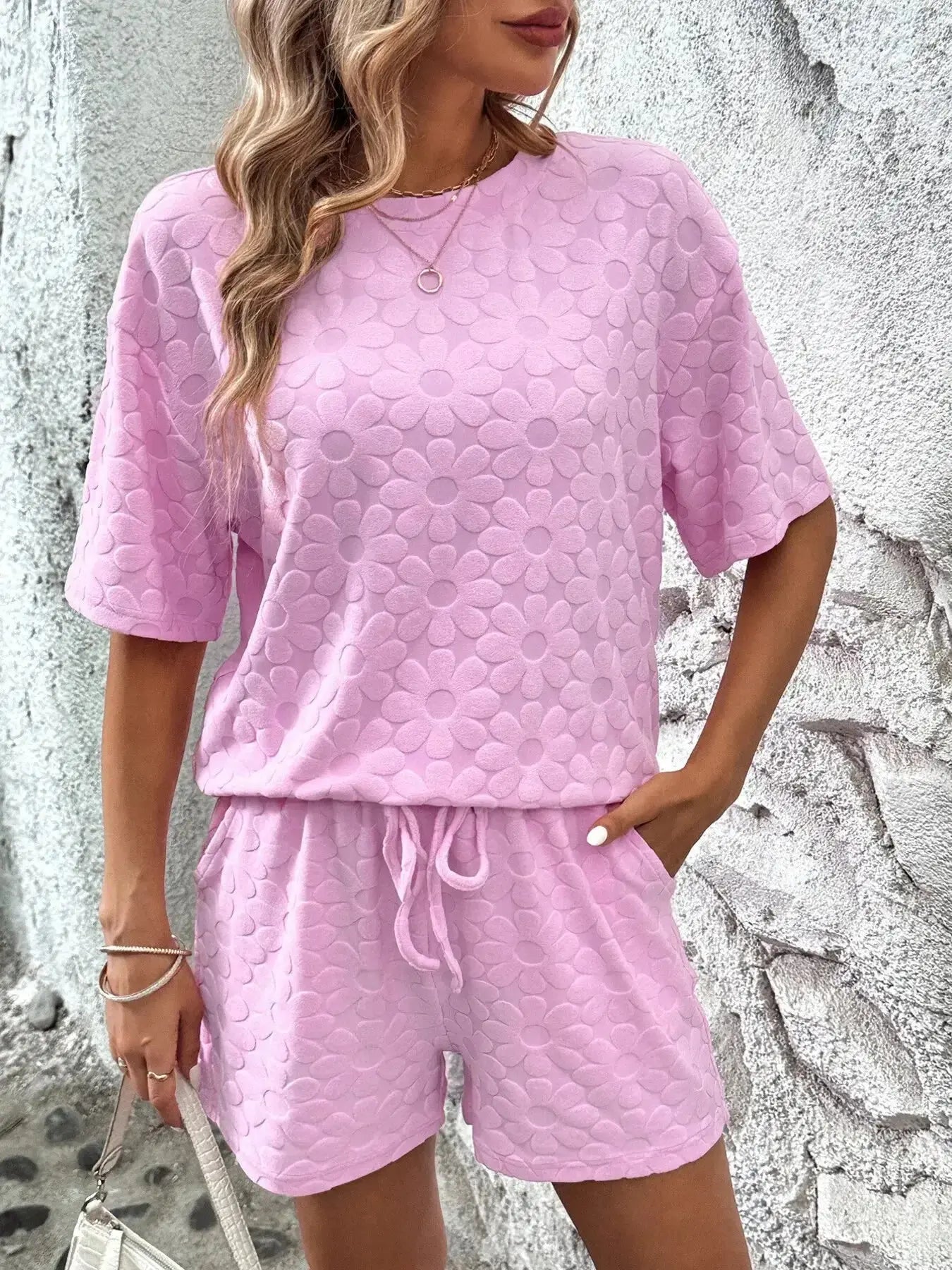 Floral print round neck top and shorts lounge set by Trendsi, soft pajamas with vibrant floral design for comfortable lounging.