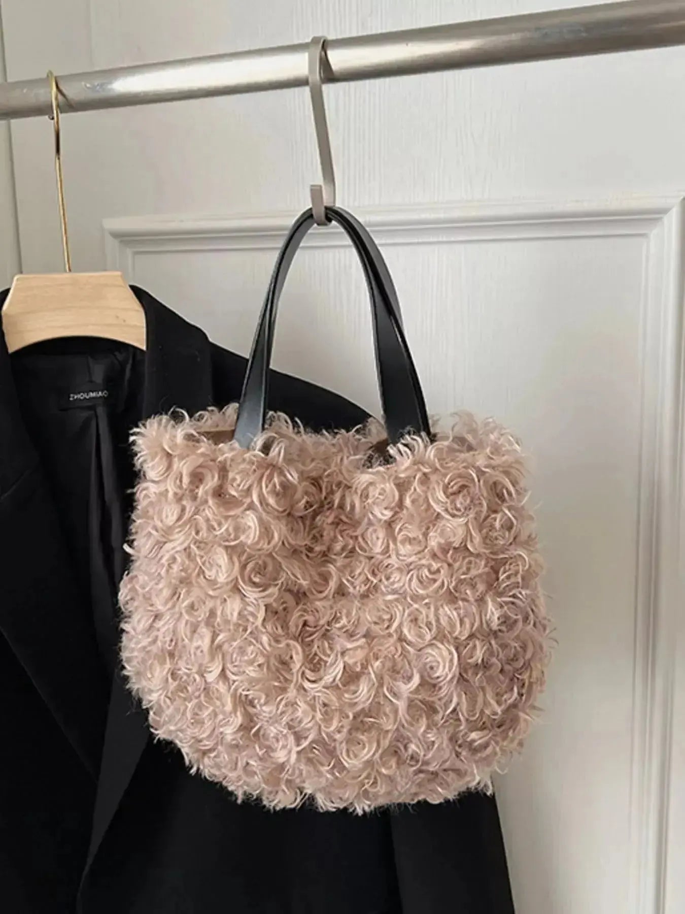 Lightweight plush faux fur shoulder handbag with soft, fluffy texture from Trendsi, perfect for stylish casual wear.