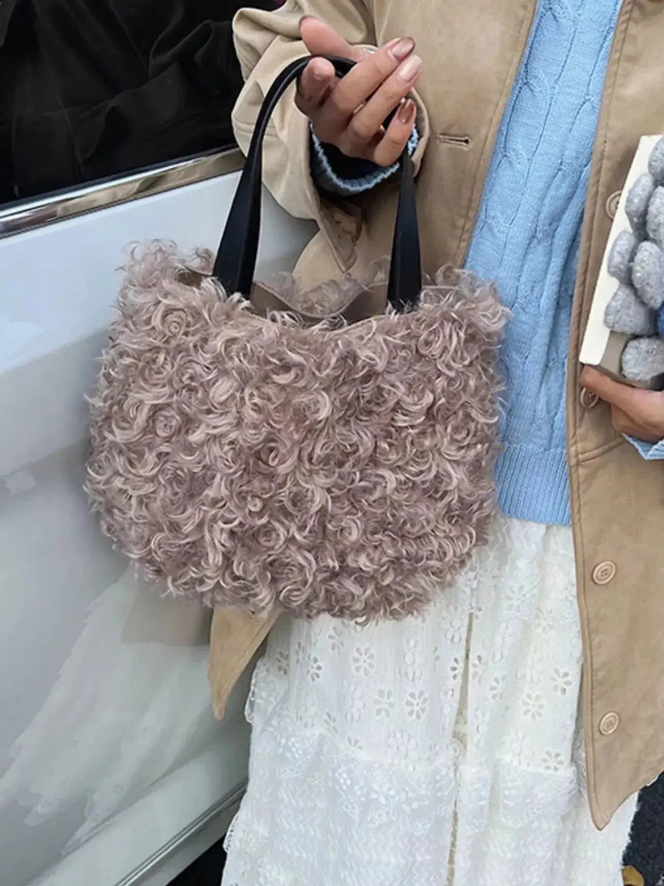 Lightweight fluffy plush shoulder bag by Trendsi with soft faux fur exterior, stylish handbag for everyday use.