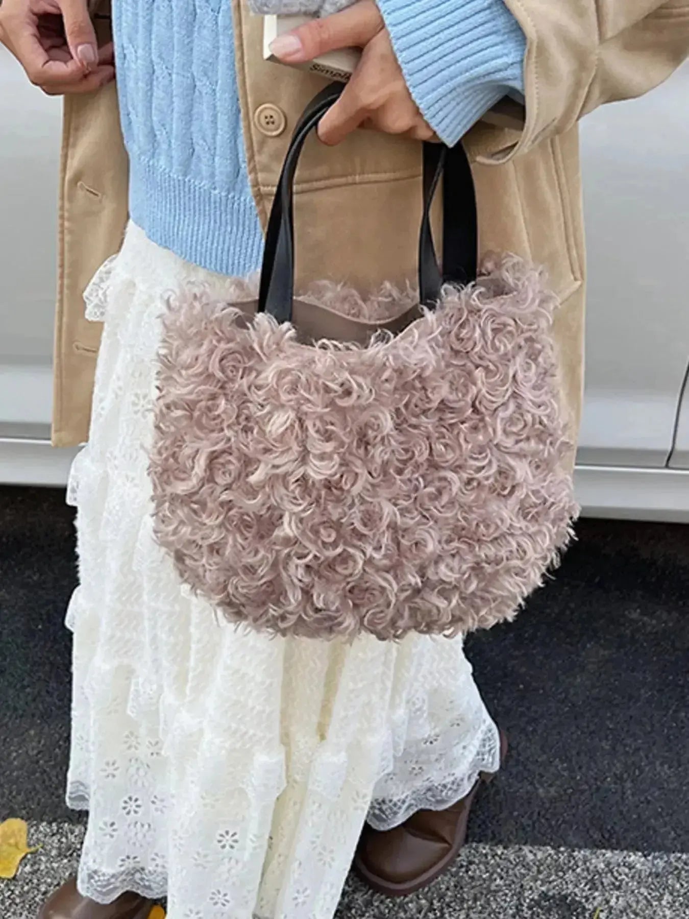 Lightweight fluffy plush faux fur shoulder handbag by Trendsi, soft and cozy with a stylish design.